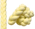 warkocz otulacz do łóżeczka pastelowy żółty.png